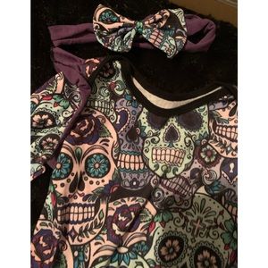 Skull onesie with matching head band